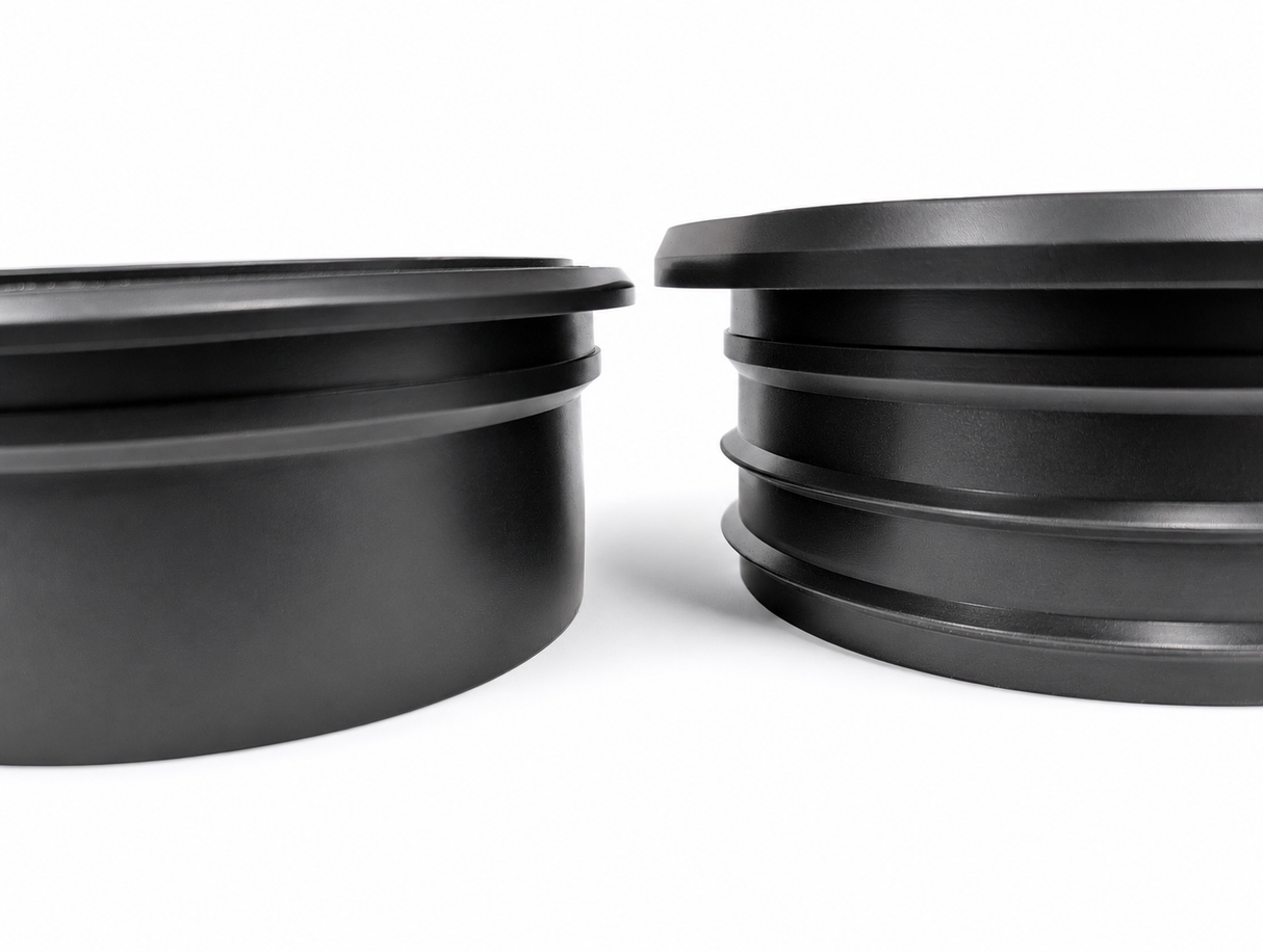 SlabCollar EPDM bushing showing top flange and ribbed body sealing surfaces