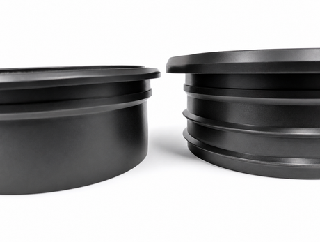 SlabCollar EPDM bushing showing top flange and ribbed body sealing surfaces
