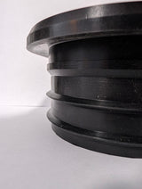 Actual SlabCollar unit — side view showing flange and compression ribs